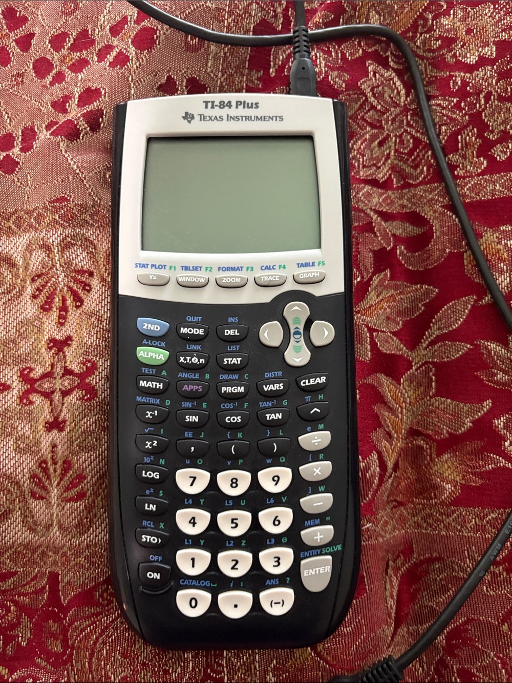 Texas Instruments TI-84 Plus Graphing Calculator in Black and White